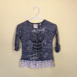 A quarter length sleeved shirt